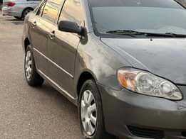 A picture of Distress toyota corolla super clean 2003 4 model Ac need
