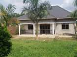 A picture of BEAUTIFUL HOME FOR SALE 95m located at matugga kavule town