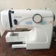 A picture of Sewing Machines Pressing Irons