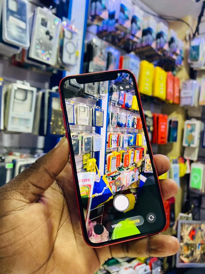 A picture of IPHONE 12 Mini...USES WI FI ONLY AT ONLY 380 000