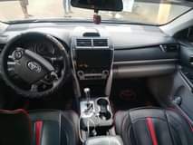 A picture of NEATLY USED TOYOTA CAMRY 2013 BOUGHT JANUARY THIS YEAR 2023