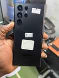 A picture of Uk used Samsung s22 ultra 5G with receipt. 8gig 128.