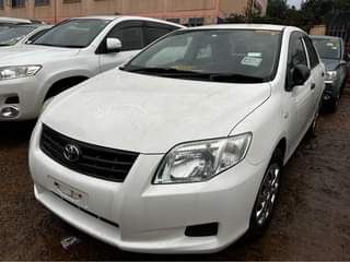 A picture of Toyota Axio Pearl white 30M