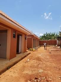 A picture of 7double rooms for sale at nansana kabulengwa seated on 60by