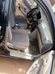 A picture of PARTIALLY FIRST BODY NIGERIA USED TOYOTA COROLLA WITH good engine