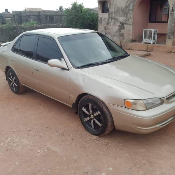 A picture of Corolla 2001 Engine Gear AC Needs Gas Clean fabric interior