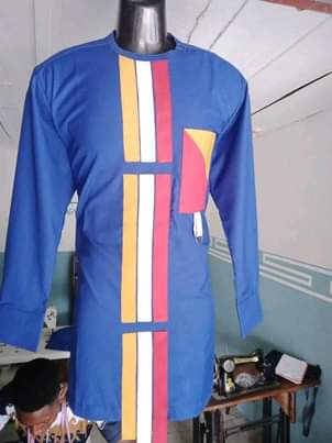 A picture of My husband handwork cut and sew Fashion designer 08035070839 Location
