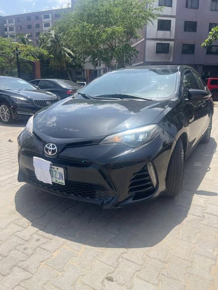A picture of 2015 Toyota Corolla clean sharp Nigerian use buy and drive