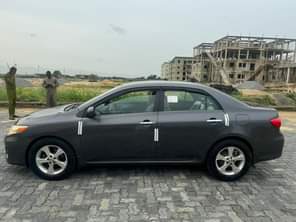 A picture of WOW This is premium standard Toyota Corolla 2013 model registered