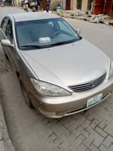 A picture of 2006 Toyota Camry 4plugs Engine Untouched Engine and Gear working