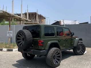 A picture of 2023 Jeep Wrangler Rubicon. Available now. Inspection ready Dozkings Global