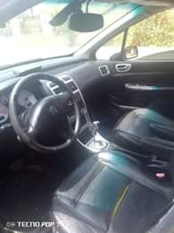 A picture of Neatly and newly baked Peugeot 307 salon with super sound