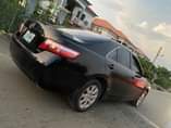 A picture of Complete first body 08 Camry XLE with open roof and