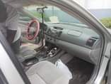 A picture of Toks Standard Firstbody 2004 Toyota clean interior and exterior engine