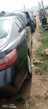 A picture of Toyota Camry 07 model in Kubwa Pimpim engine chilling AC