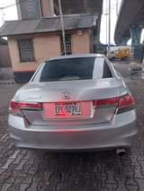 A picture of 2009 Honda Accord Engine gear and AC is dope Price