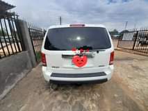 A picture of 2009 Honda pilot upgraded to 2013 10 months use u