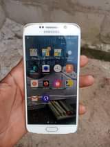 A picture of Samsung galaxy s6 plain gb32 ram3 kipengel homeback fail