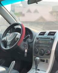 A picture of Brand TOYOTA Model Corolla Registered YEAR 2010 Color Black Price
