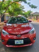 A picture of 8months drive Toyota Corolla 2015 model Location Asaba Delta State
