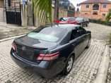 A picture of This is super clean Camry 2010 model baked from toks