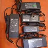 A picture of LAPTOP ADAPTER CHARGER