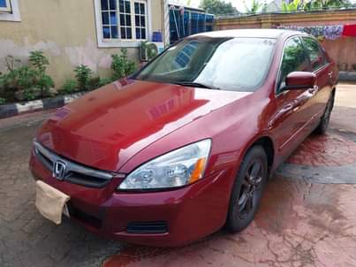 A picture of Honda Accord DC 2007 Model Colour red Condition clean used