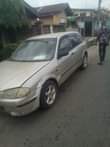 A picture of Mazda 323f automatic transmission everything perfect location Ibadan price 700