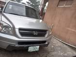 A picture of Good Deal BRAND Honda MODEL Pilot YEAR 04 PAINTED ON