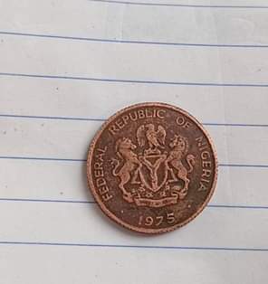A picture of If you have this 1kobo coin of 1975 or Queen
