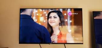 A picture of Hisense smart tv 40 inches plus the new woofer both