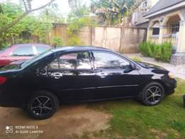 A picture of Distress sale Superclean Corolla good engine and gear AC has