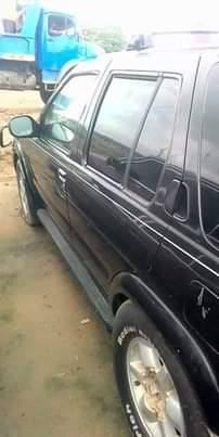 A picture of 2004 Black 2004 Pathfinder Nissan jeep B