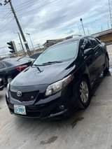 A picture of Fastest finger oooo 2011 Toyota Corolla Flash on first body
