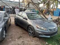 A picture of Honda Accord 09 Everything working perfectly 4plugs neatly Baked Lagos
