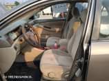A picture of Highest grade Toyota Corolla everything is intact and untouched 03