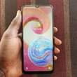 A picture of samsung A04e 0655695769 32gb BEI 170 000 ram 3gb face
