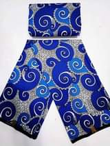 A picture of Quality lace Ankara fabrics materials For more information contact me