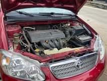 A picture of Sharp 2004 Toyota Corolla with sound engine and gear AC