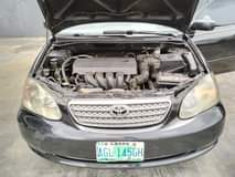A picture of Sharp buy and drive 2004 Toyota Corolla with everything working