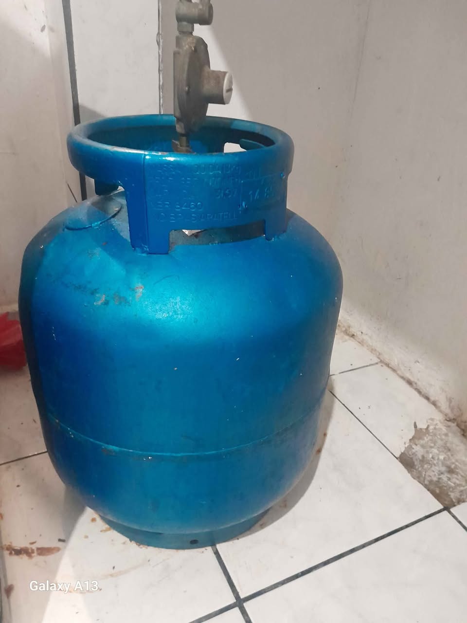 A picture of Botijao de gas com mangera