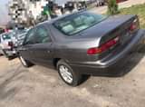 A picture of 2000 Camry Tiny light Available buy and drive Everything intact