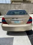 A picture of Toyota camry 2004 first body pan Untampered engine and gear