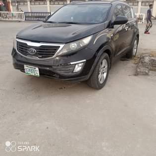 A picture of Kia Sportage 2013 model sound engine gear ac chilling some