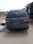 A picture of 2002 Toyota Sienna Complete First Body Engine Gear Ac Absolutely
