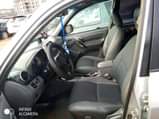 A picture of Toyota Rav 4 four plugs engine everything is intact and