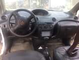 A picture of Toyota Yaris painted on first body engine and gear AC