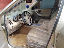 A picture of Nissan Murano 05 model Gear is selecting perfectly AC is