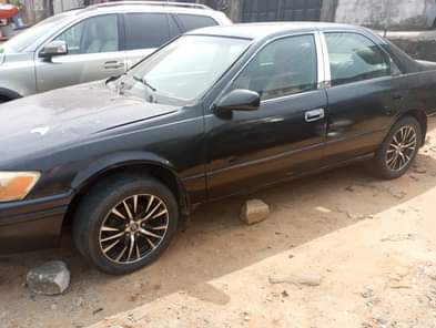 A picture of This car is Toyota Camry aka tiny light Engine sharp