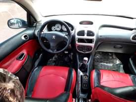A picture of BELGIUM STANDARD NORMAL HAND PEUGEOT 206 WITH MANUAL TRANSMISSION